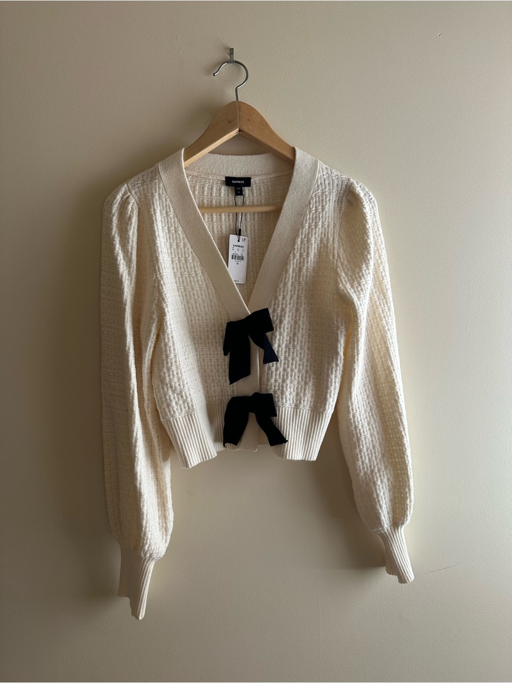 Express Cream Cropped Knit Cardigan with Black Bow Accents